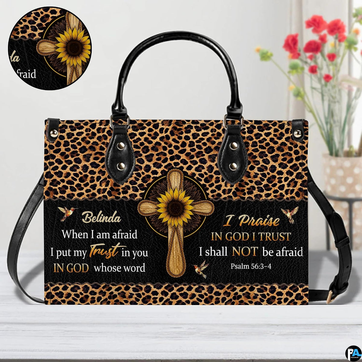 Interior compartment view displaying lining and pocket organization of leopard cross handbag.