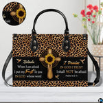Interior compartment view displaying lining and pocket organization of leopard cross handbag.