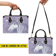 Matching unicorn wallet lying flat displaying the coordinating regal unicorn artwork.