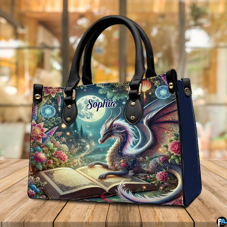 Perspective view of celestial dragon handbag resting on rustic wood surface.