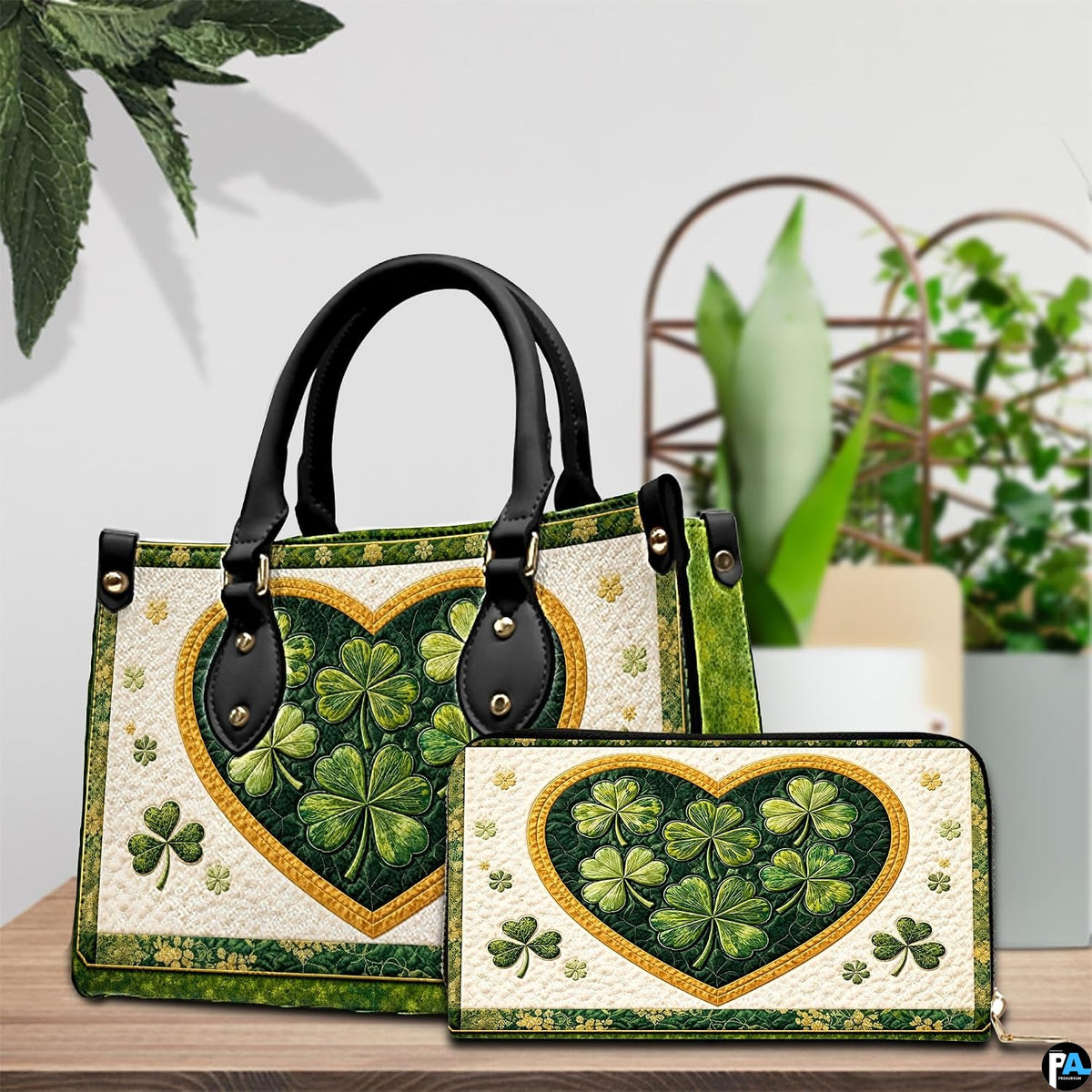 Green clover heart handbag with coordinated wallet on a tabletop