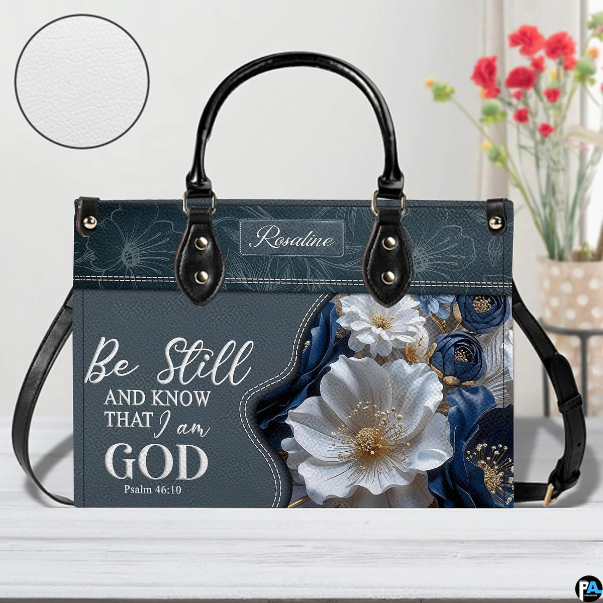 Side perspective view of Bible verse purse highlighting structured silhouette and carry handles.
