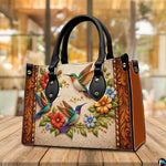Handbag standing upright on wooden surface in warm ambient indoor setting.