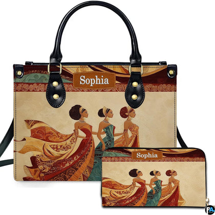 Handbag and matching zip wallet displayed together showcasing regal African queen figures in swirling gowns.