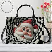 Front view of optical illusion checkered vortex Santa Claus handbag displayed next to floral vase
