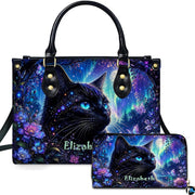 Studio presentation showing aurora cat artwork alongside matching companion accessory on plain white surface.