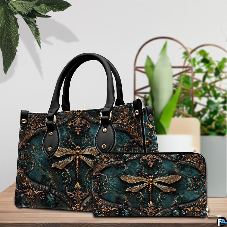 Side profile of gold dragonfly handbag showing continuous Victorian damask pattern along gusset