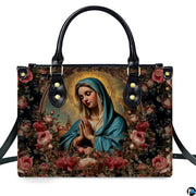 Isolated front view of devotional handbag with cerulean mantle Virgin Mary and roses