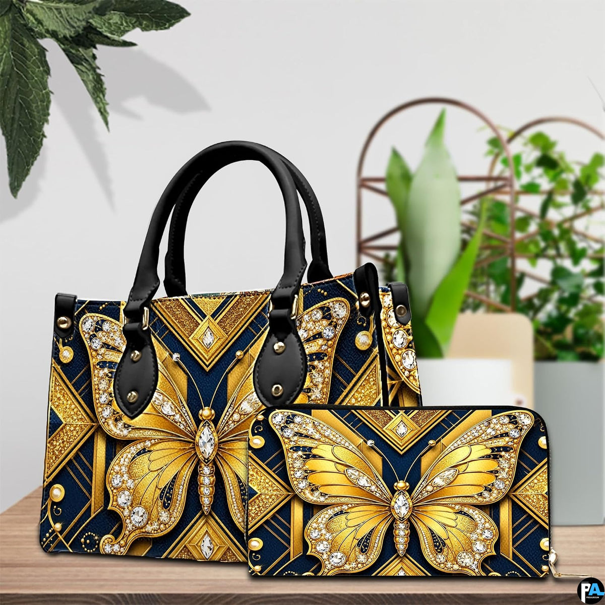 Lifestyle tabletop view showing golden butterfly artwork placed beside decorative indoor house plants.