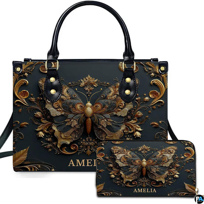 Front view of antique gold Baroque butterfly handbag and matching zip wallet on white backdrop