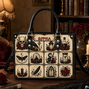 Gothic flash grid satchel displayed on a dark wood table surrounded by antique tomes and candlelight.