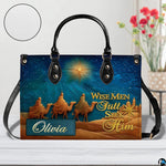 Alternative angle display of three magi desert caravan handbag and matching wallet set