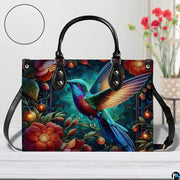 Side profile view of twilight hummingbird handbag displaying structured silhouette and depth.