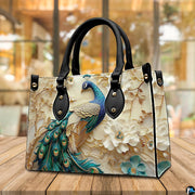 Angled peacock handbag with white blossoms and gold branches