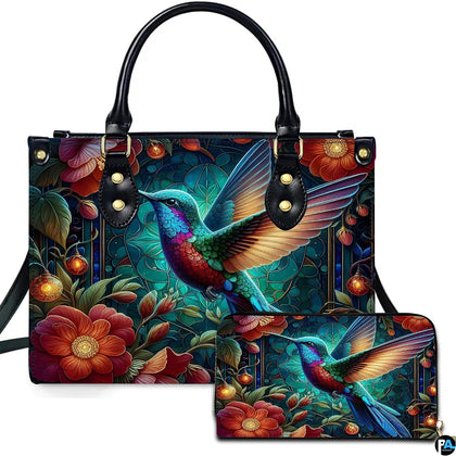 Front view of luminous hummingbird handbag and matching wallet with glowing lanterns and crimson flowers.