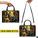 Peacock window handbag shown in top-handle and shoulder carry styles