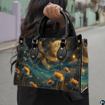 Street fashion view of model carrying celestial dragonfly handbag by the top handle