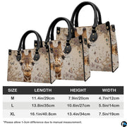 Coordinated arrangement of giraffe handbag and wallet presenting the unified safari theme.