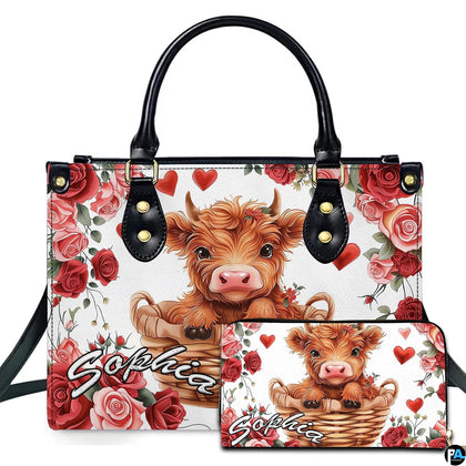 Front studio view showing fluffy Highland calf in a woven wicker basket surrounded by red roses and hearts.