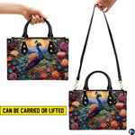 Peacock floral handbag shown in top-handle and shoulder carry styles