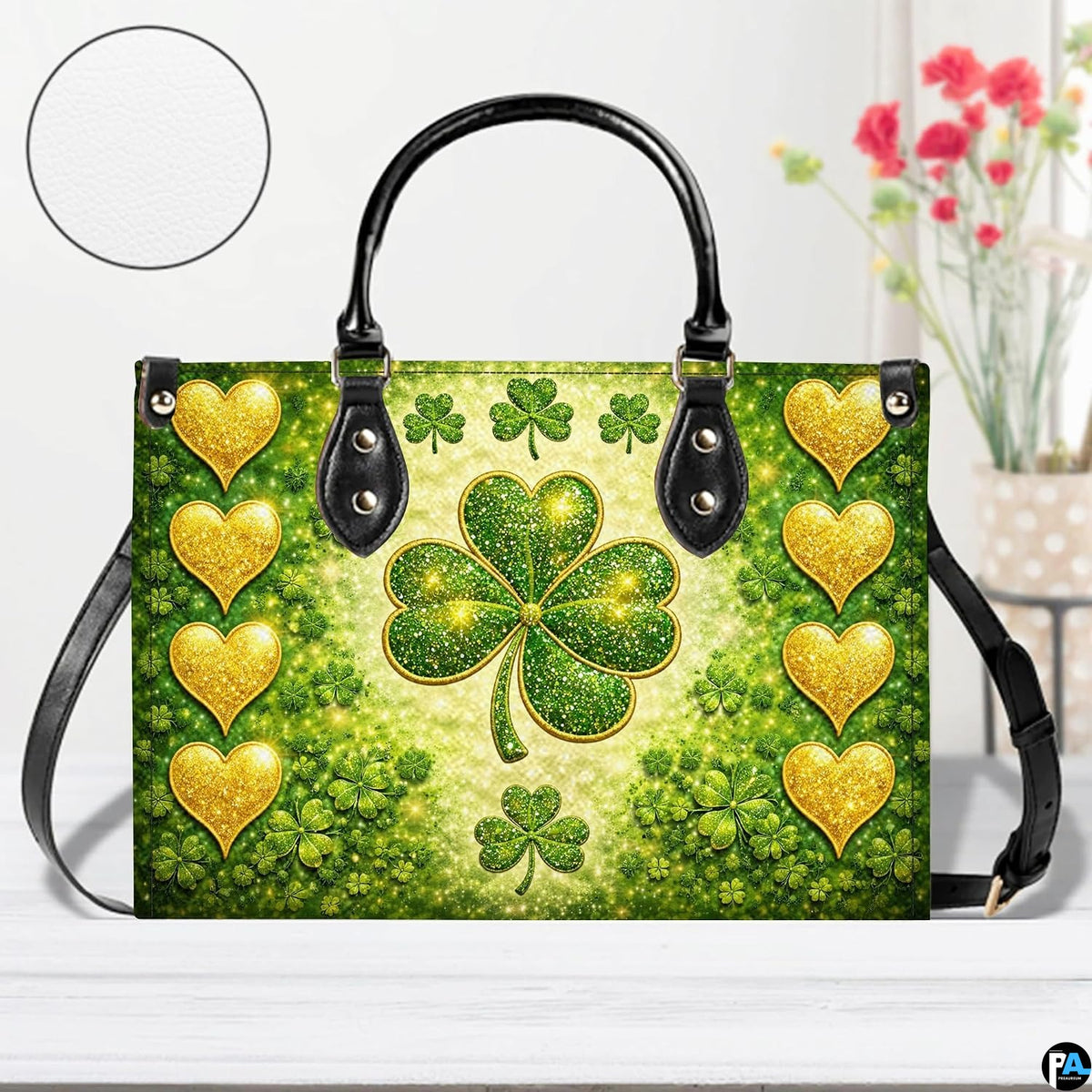 Front view of green clover handbag with gold hearts and starry sparkles