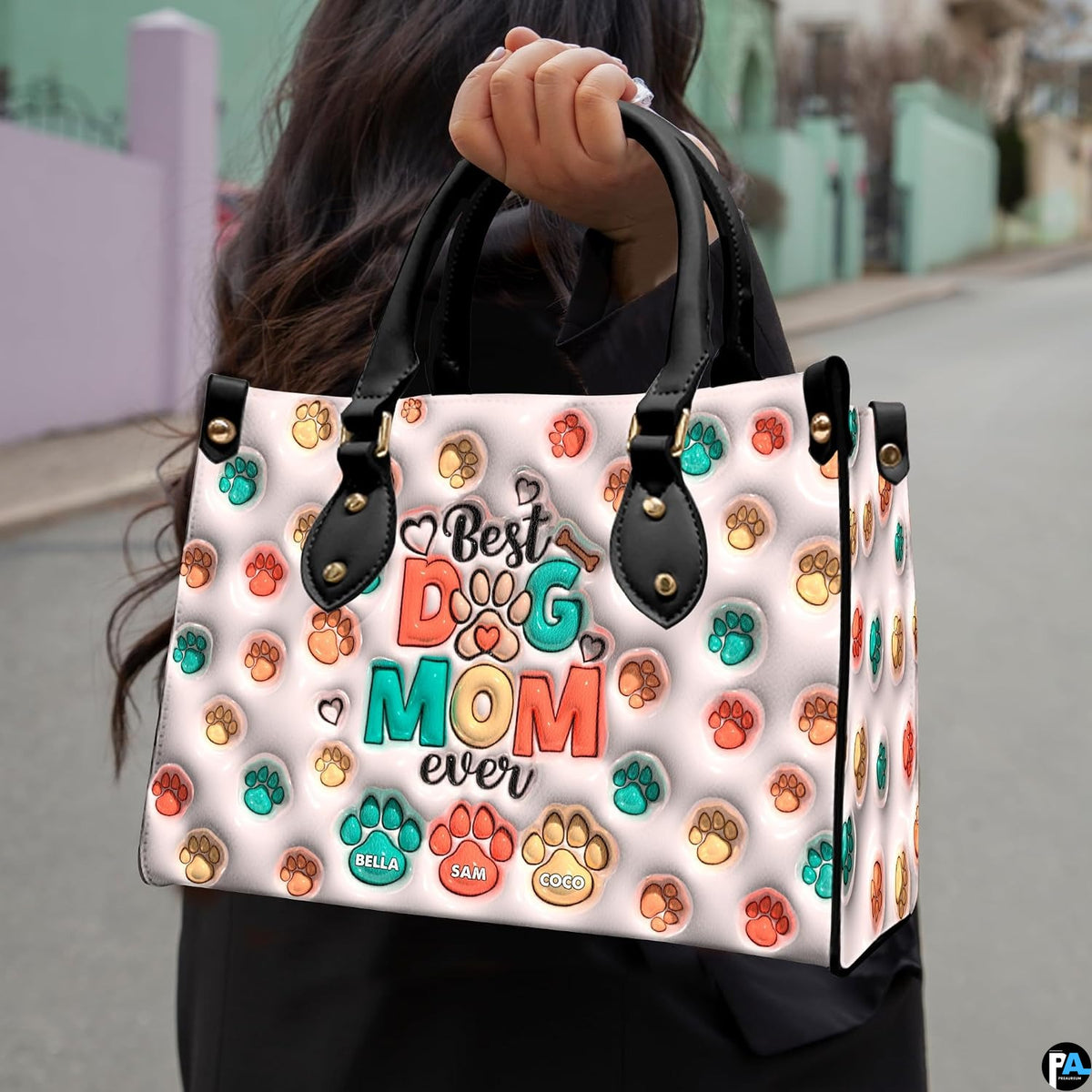 Coordinating pastel paw print tote handbag and zippered wallet duo