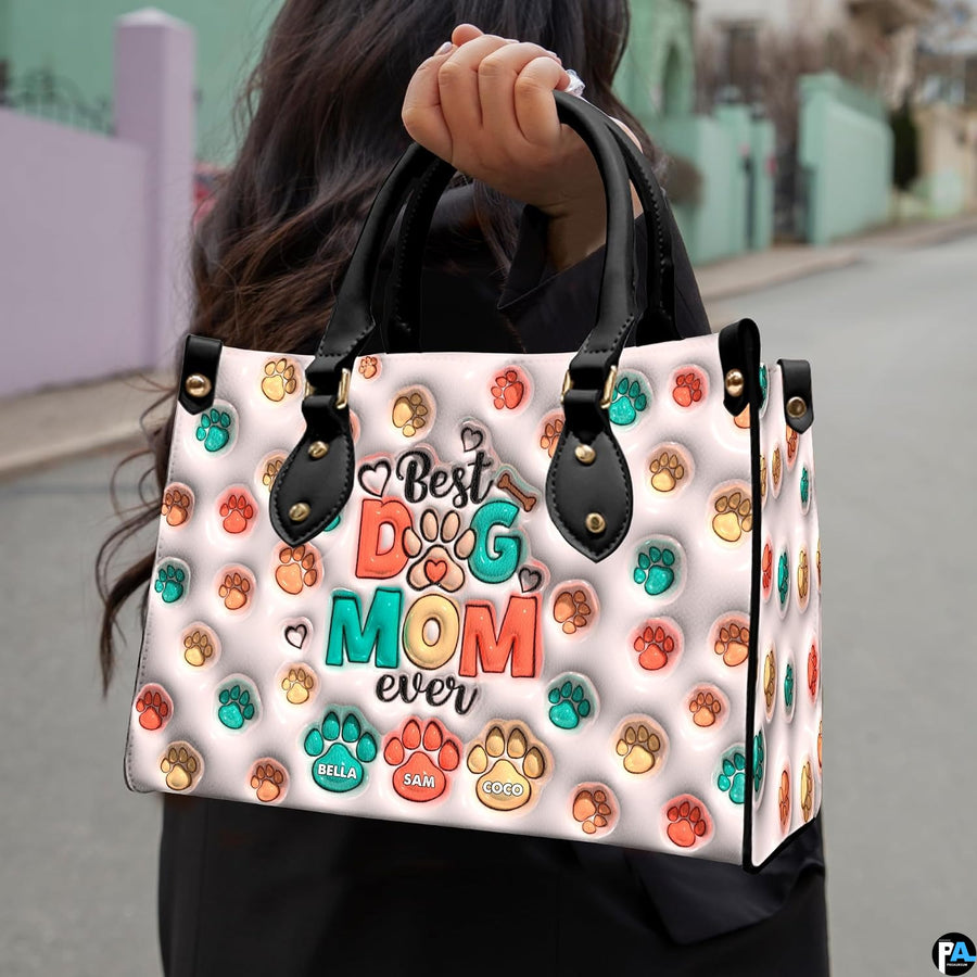 Coordinating pastel paw print tote handbag and zippered wallet duo