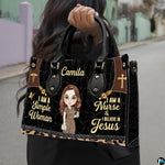 Christian nurse handbag held outdoors showing visual scale against street setting.