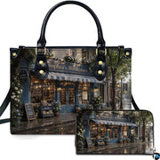 Rainy street storefront with blue striped awning and hydrangea planters on matching handbag and wallet set.
