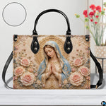 Virgin Mary and blush roses handbag displayed with surface texture zoom inset