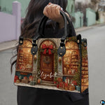 Outdoor lifestyle view of model carrying the Victorian Christmas shop handbag.