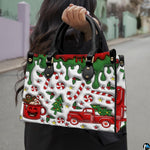 Lifestyle display carried outdoors highlighting seasonal red truck and gingerbread mug artwork.
