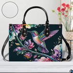 Handbag standing upright on wooden tabletop in softly lit indoor room.
