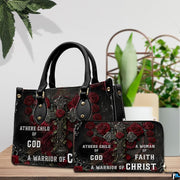Detailed view of gothic cross handbag showing handle hardware and central rose on the cross.
