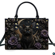 Direct front studio view showcasing the gothic black cat, golden crescent moon, and purple peonies on white surface.