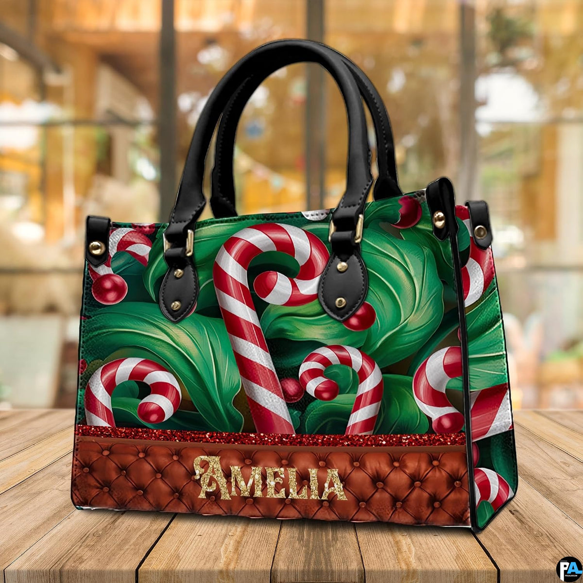Front view of the candy cane accessory resting on a wooden surface against warm interior lighting.