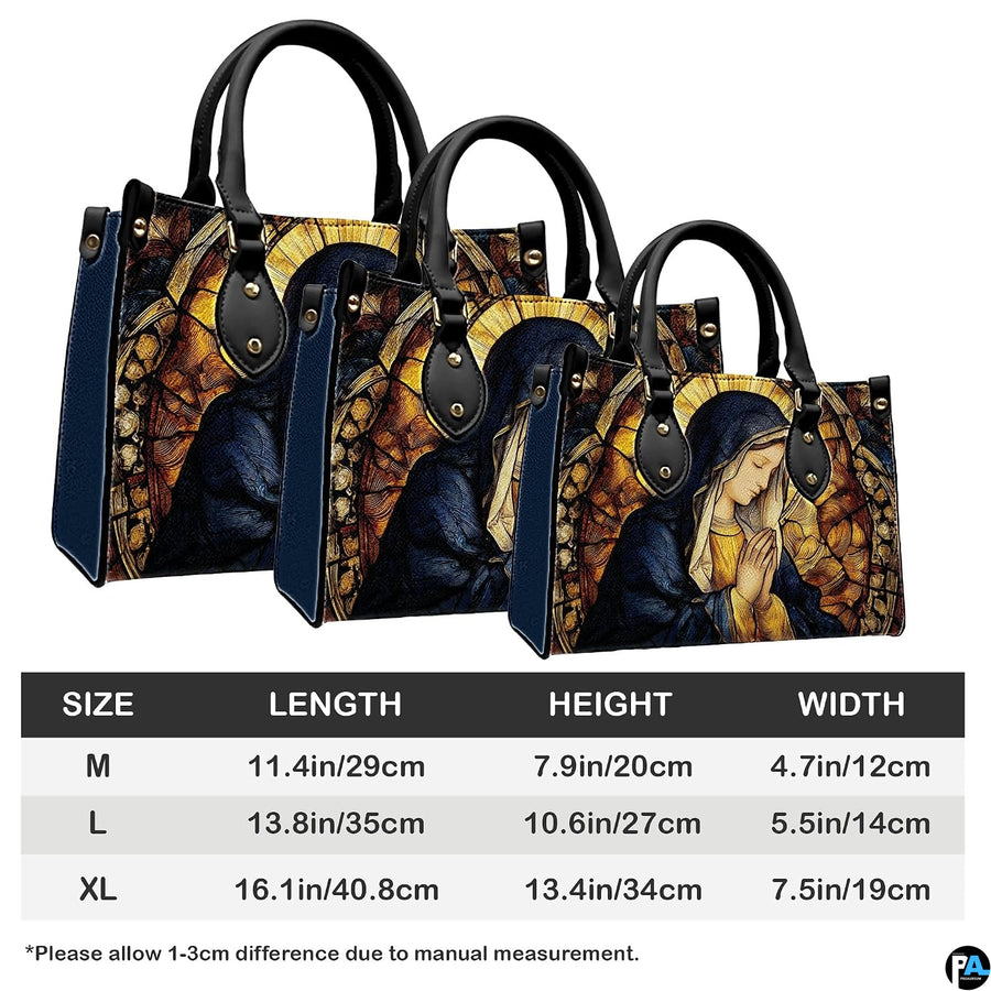 Product dimensions and sizing guide diagram for the praying Madonna handbag