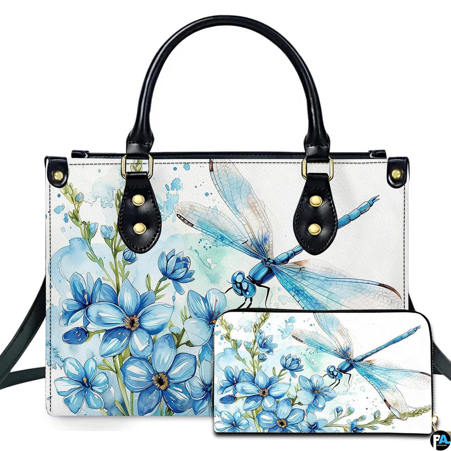 Watercolor blue dragonfly and forget-me-not floral handbag and wallet set displayed against a white background