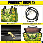 Detail views of green clover handbag with gold heart artwork