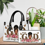 Tabletop presentation showing the floral faith artwork and matching accessory standing beside green house plants.
