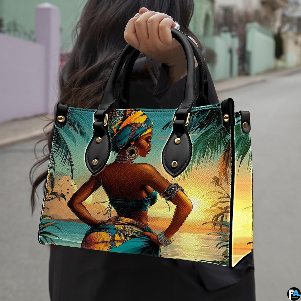 Street lifestyle perspective showcasing the coastal sunset artwork in daytime light.