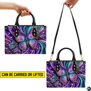 Alternative angle display of purple crystal butterfly handbag and wallet