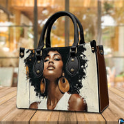 Lifestyle view of paint splash afro portrait handbag on a wood tabletop