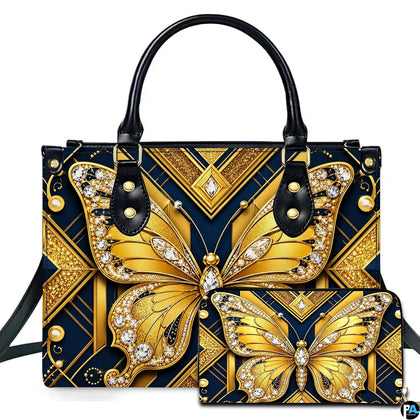 Studio presentation showing golden butterfly artwork alongside matching companion accessory on white surface.