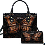 Sculpted copper butterfly handbag and matching wallet set shown against a plain white studio background.