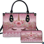 Front view of pastel rose unicorn handbag and matching wallet set on sparkling pink glitter background.