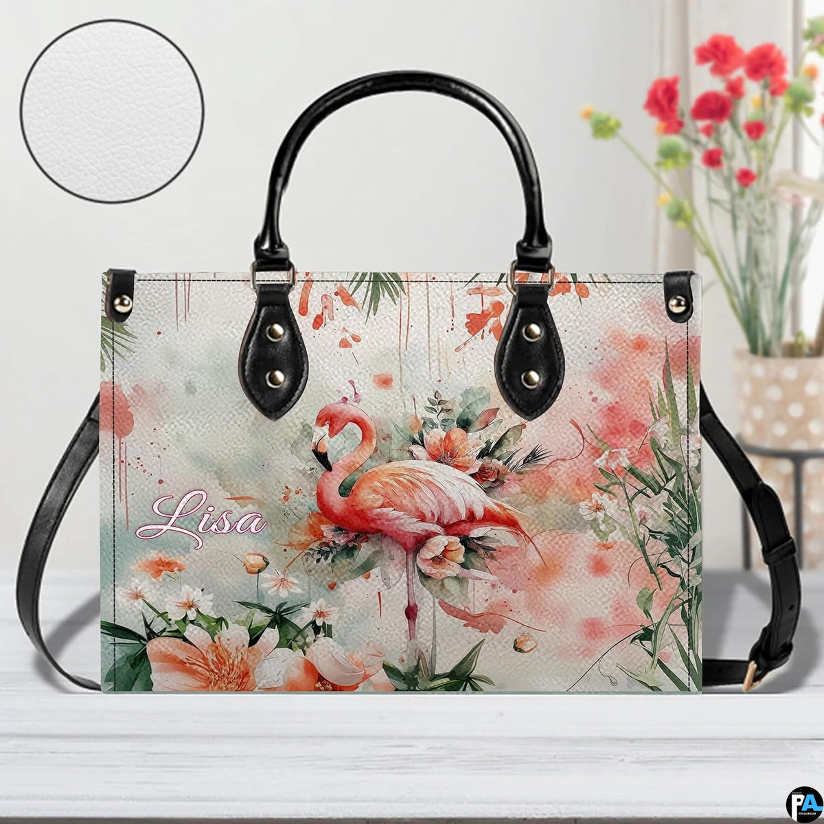 Side street view of model carrying the botanical flamingo floral handbag.