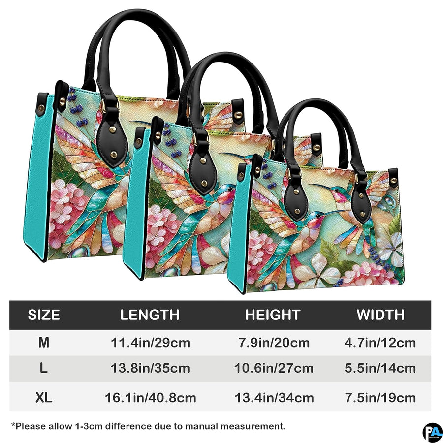 Detailed view of mosaic floral petals and delicate botanical leaves across handbag.