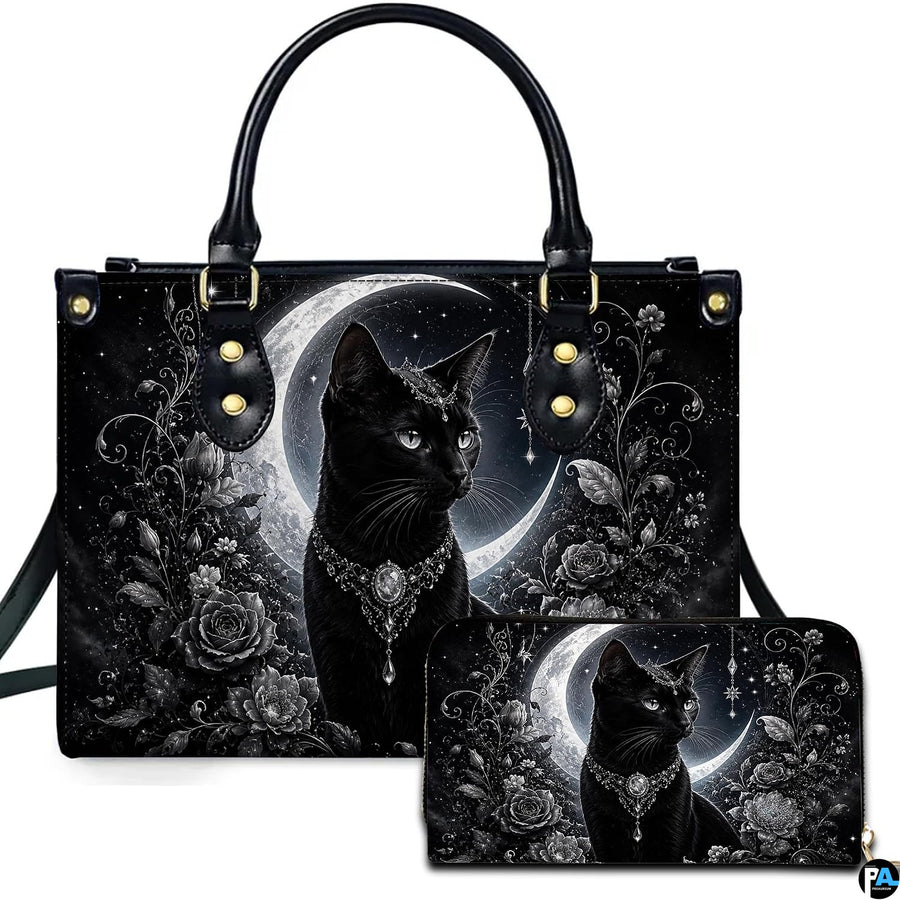 Studio view showcasing crowned black cat artwork alongside matching companion accessory on plain white surface.