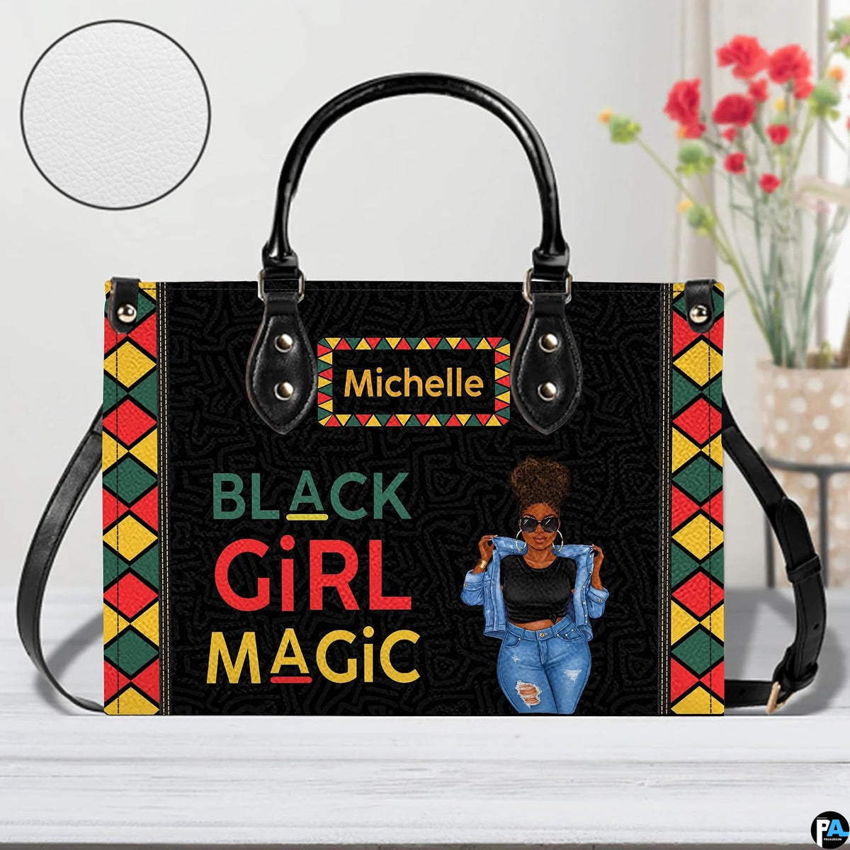 Front perspective of afrocentric artwork accessory displaying illustrated woman against dark labyrinth backdrop.